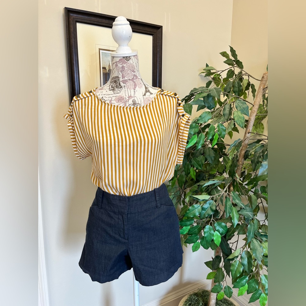 stripped sheen shirt with button detailing on front sides off the shoulder